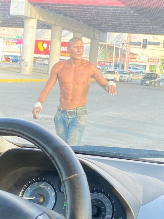 Image of the muscular windshield wiper man that went viral on Facebook