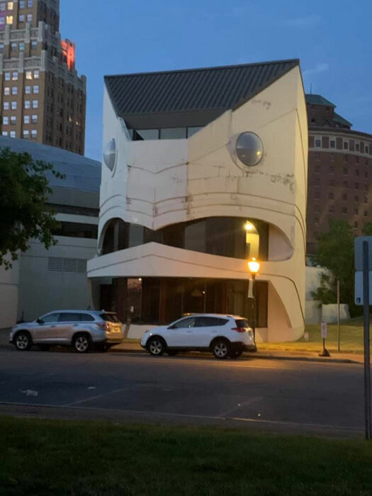 cream colored house with strange construction