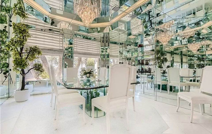 dining room with many mirrors