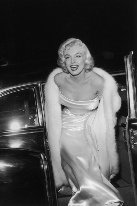 Monroe getting out of a car