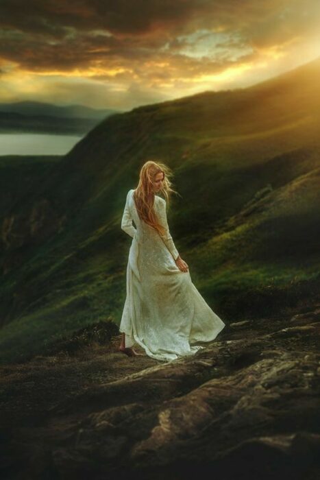 woman in the grasslands of semi backs