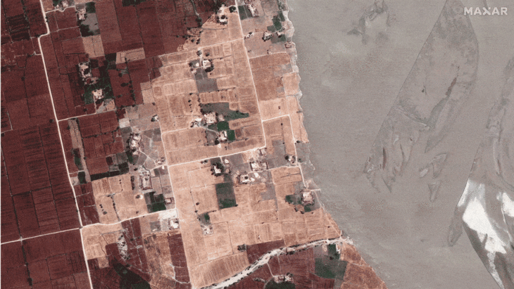 Fields and houses along the Indus River before the floods in Rojhan, Pakistan