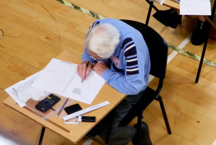 Grandpa passes math test with the highest grade