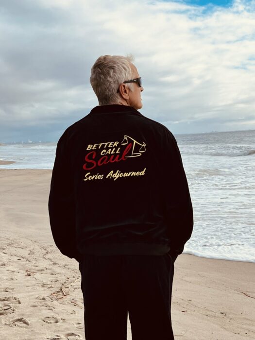 actor Bob Odenkirk showing off a Better Call Saul series logo jacket 