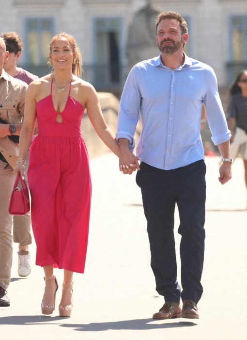 Jlo walking hand in hand with her husband Ben Affleck on their honeymoon 