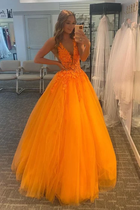 13 Vestidos naranjas que te convertirán en la reina de la fiesta