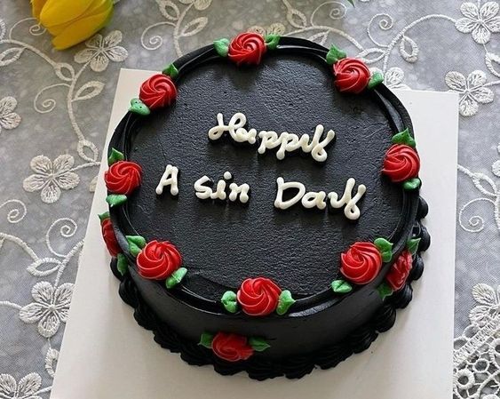 black cake with red flowers