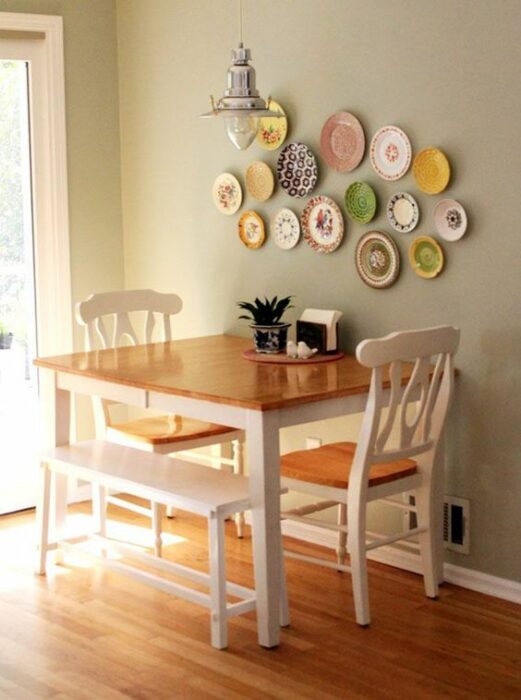 dining room with chairs and bench