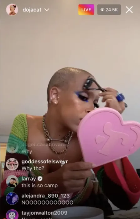 Doja Cat shaving during a live on instagram