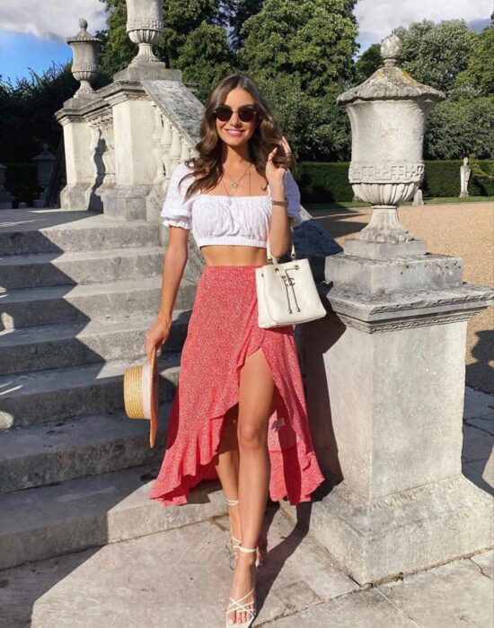 image of a girl with a pink open skirt matching a white top 