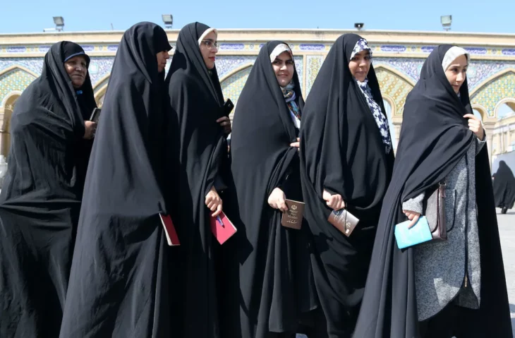 Women in Iran wearing burqa