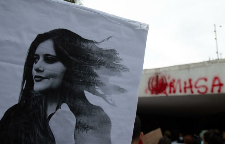 Iranian students tear down cafeteria wall separating men and women in a symbolic act against repression