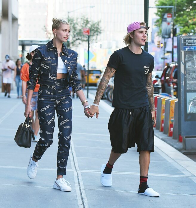 Justin Bieber and Hailey Bieber holding hands on the street 