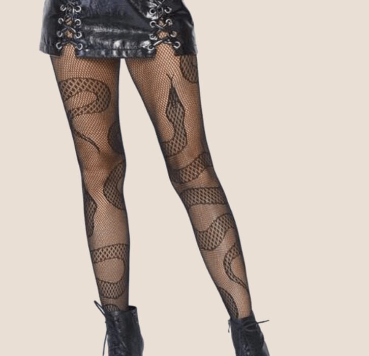 Woman in leather skirt and snake pattern stockings