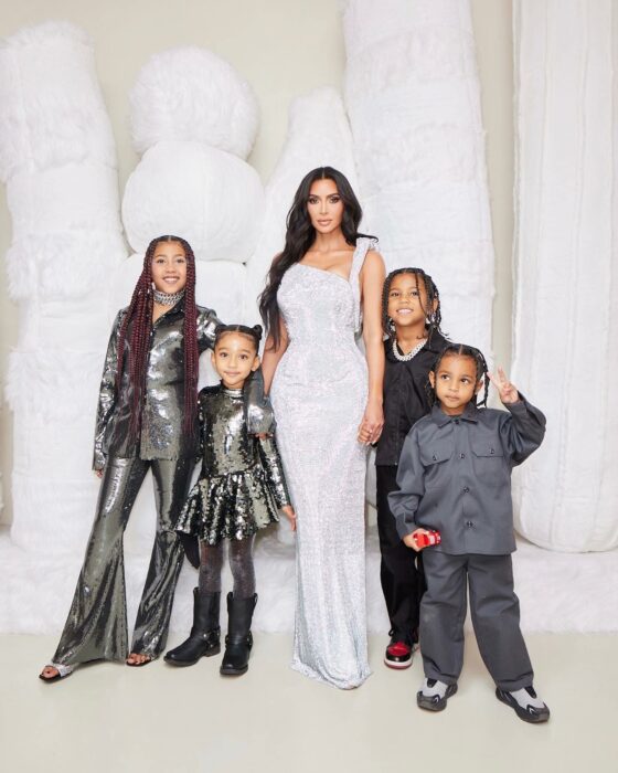 Photograph of Kim Kardashian surrounded by her four children North, Saint, Chicago and Psalm