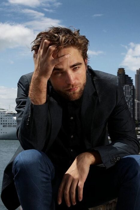 Robert Pattinson posing for magazine
