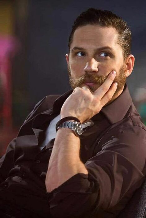 Tom Hardy posing for magazine