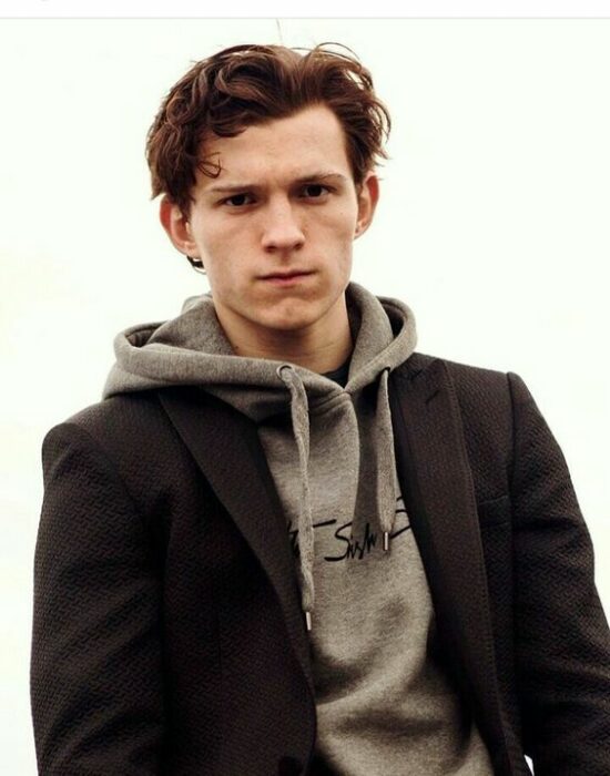 Tom Holland posing for magazine