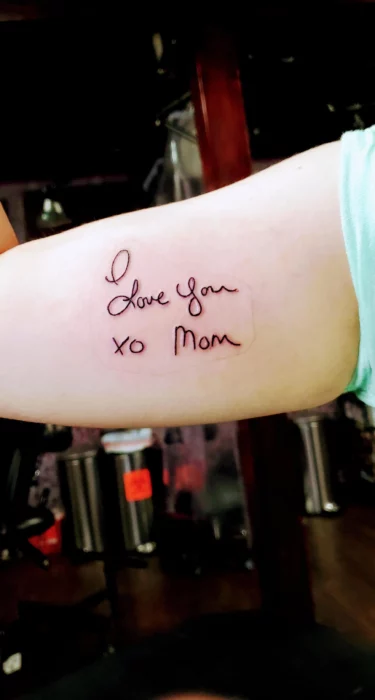 Arm with handwritten note