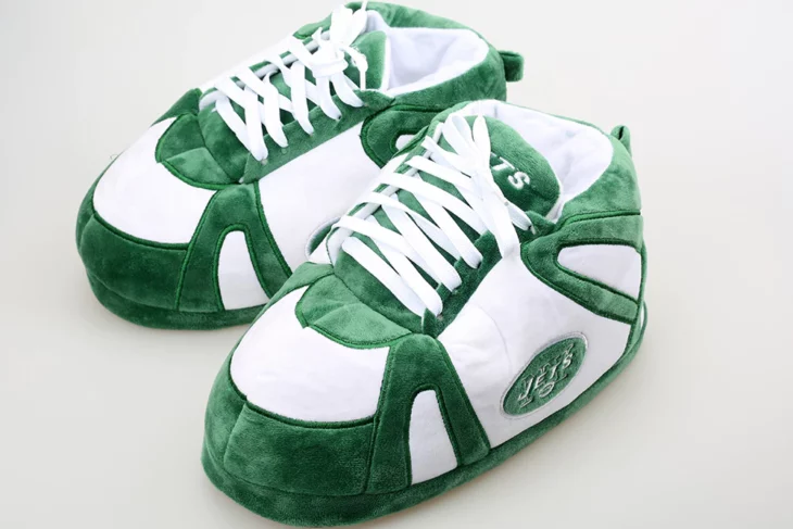 Green and white tennis slippers