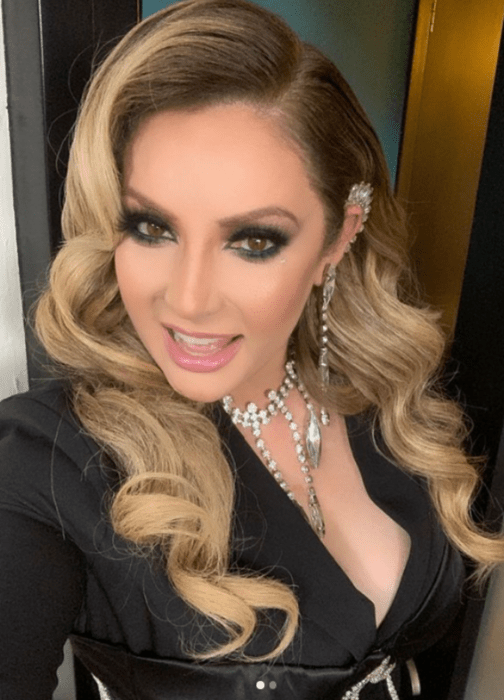 The actress Paty Navidad in an Instagram image wears a black jacket with a jewelry neckline and very marked makeup, her hair is styled with waves 