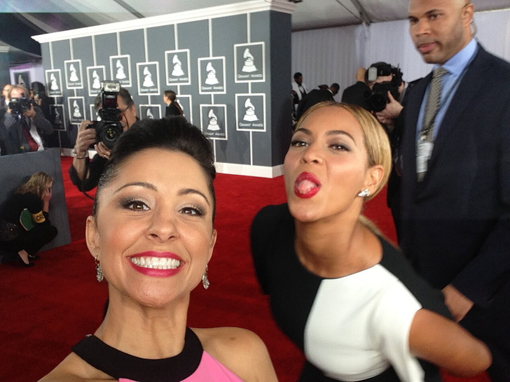 Beyonce sneaks into a photo of Nikki Boyer