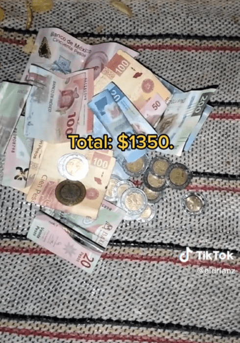 bills and coins of Mexican pesos of different denominations on a dirty cloth