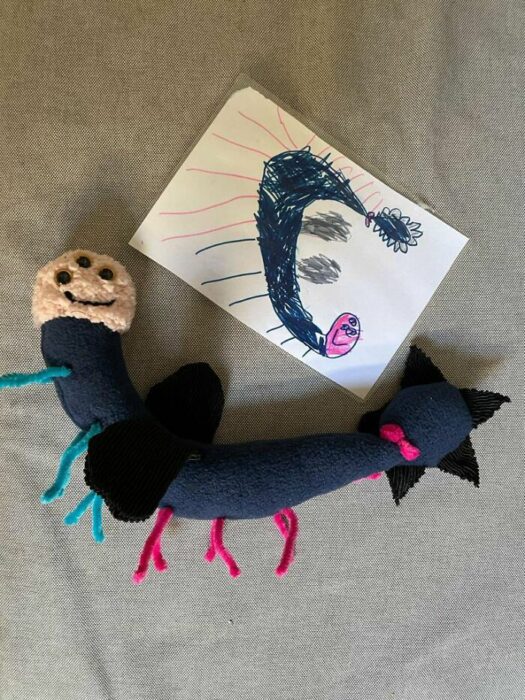 stuffed animal design drawn by a child of a caterpillar 