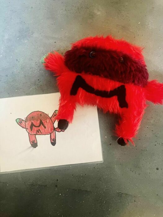 stuffed animal with mask designed by a child 