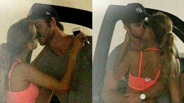 Liam Hemsworth y Eiza González besándose