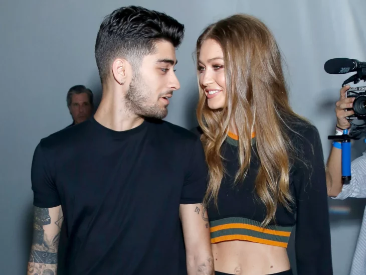 Zayn and Gigi Hadid in an image looking into each other's eyes 