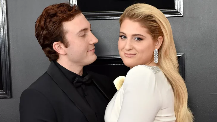 Meghan Trainor posing with her husband Daryl Sabara