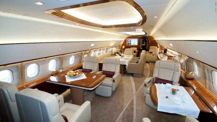 interior of a private jet with food served