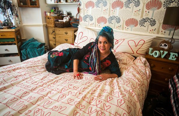 Pascale Sellick on top of her mattress topper