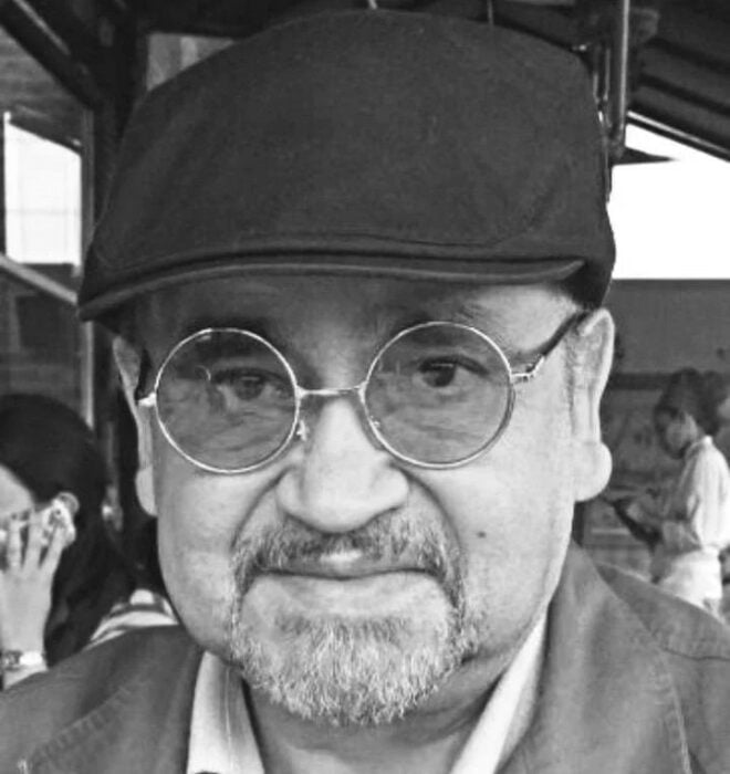 German Tovar actor with cap and glasses