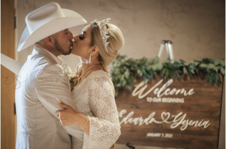 Bride and groom kissing at their surprise wedding