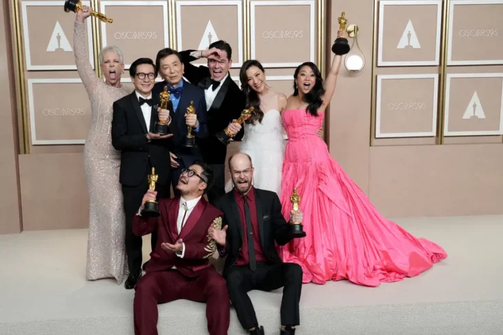 Cast and directors of Everything Everywhere at the same time celebrating with their seven Oscar 2023 statuettes 