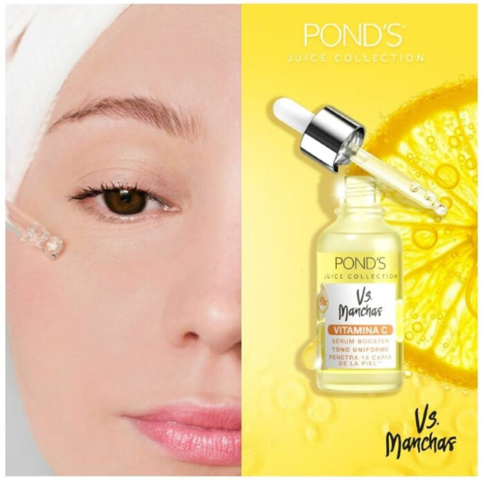 imagen ilustrativa de la cara de una mujer poniendo el suero de vitamina C de Ponds