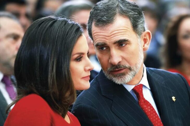 King Felipe VI and Queen Letizia of Spain chat discreetly at an event they attended