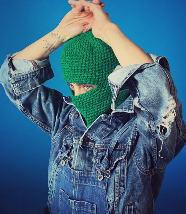 ilse halls with green balaclava 