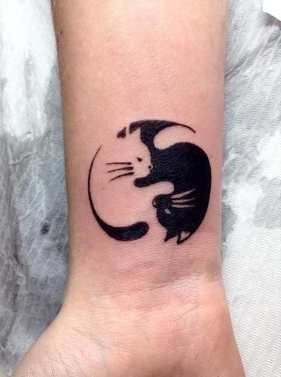 tatuaje gatos yin yang