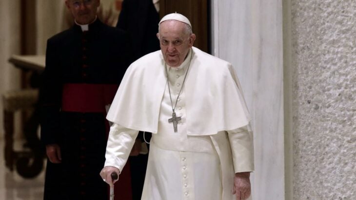 the pope walking with a cane