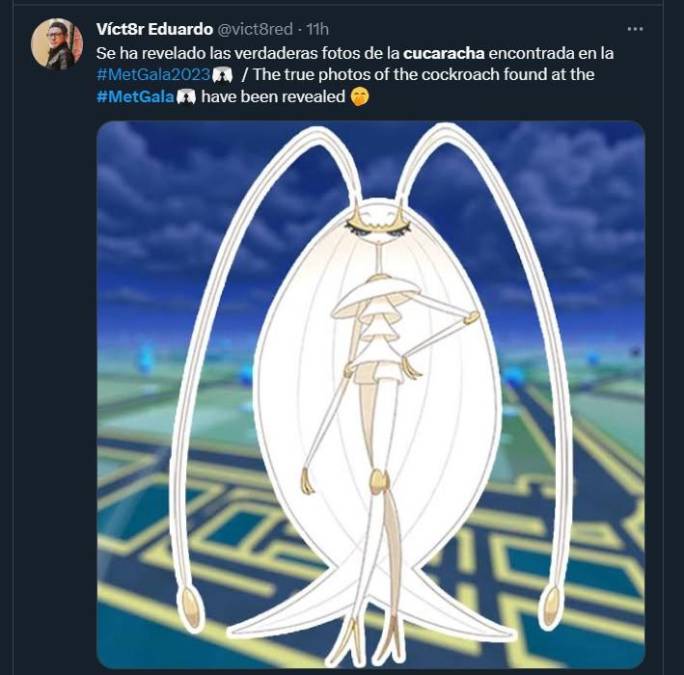 meme de cucaracha en la met con vestido blanco 