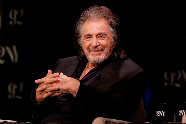 Al Pacino sitting during a conference 