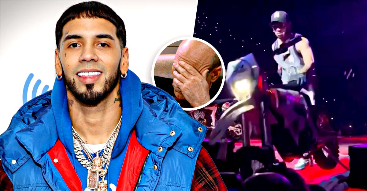 Anuel AA throws a motorcycle at his audience during a concert
