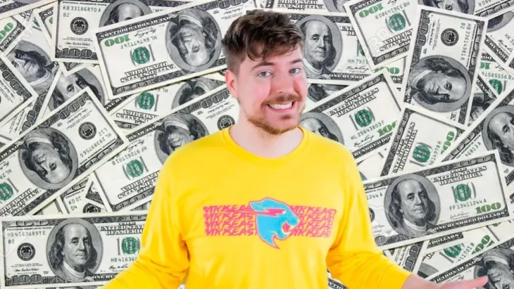Mr Beast appears with a wallpaper where a large amount of dollars can be seen