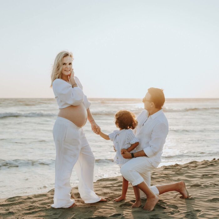 Adal Ramones his wife Karla de la Mora and their son on the beach 