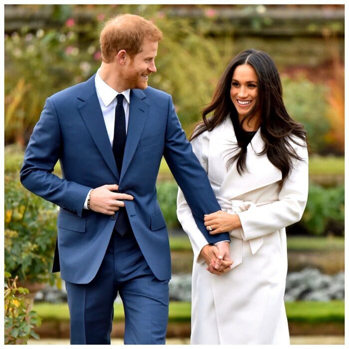 Meghan Markle caminando de la mano del príncipe Harry 