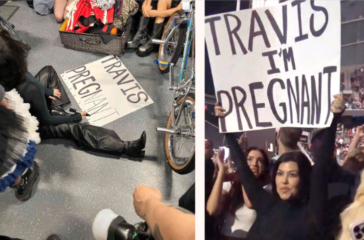 imágenes de Kortney Kardashian mientras está sentada en el piso escribiendo un cartel con letras negras en ingles para anunciarle su embarazo a su esposo Travis Barker 