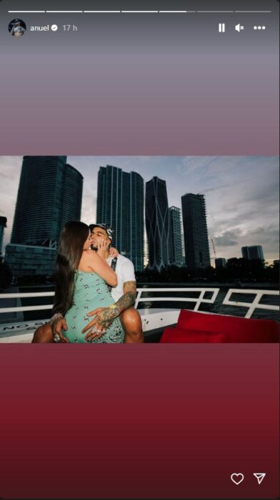 screenshot from the story of Anuel AA kissing a mysterious woman 